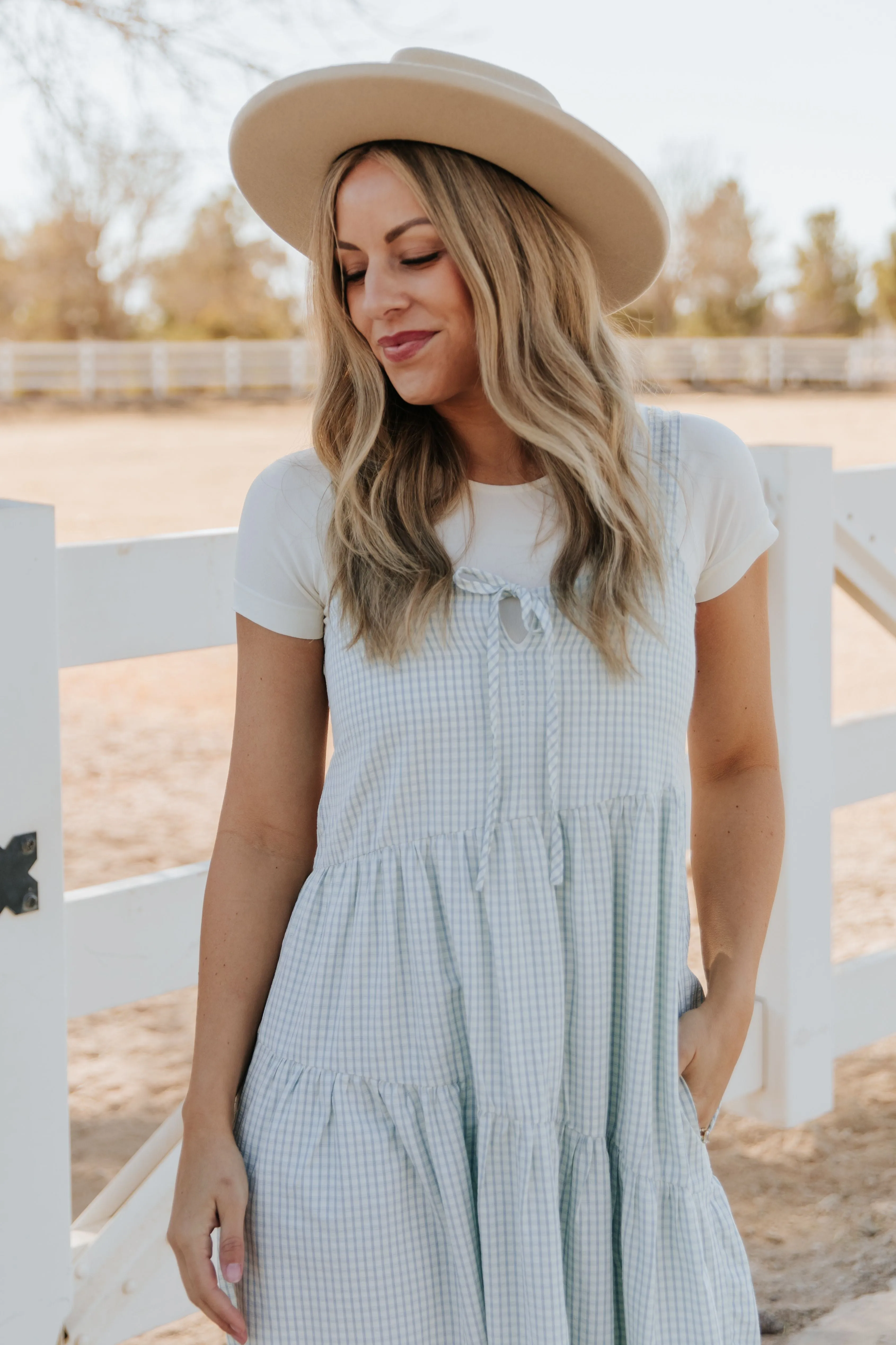 THE ALORA ASYMMETRICAL MIDI DRESS IN BLUE PLAID